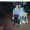 Jeffrey with his sister and brother taking a picture for their grandparents when they came to visit in 1989.